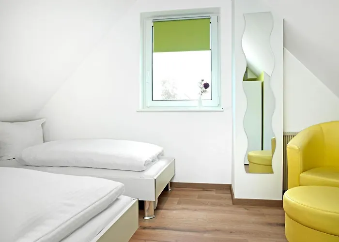 Haus Hinter Den Duenen בית נופש *